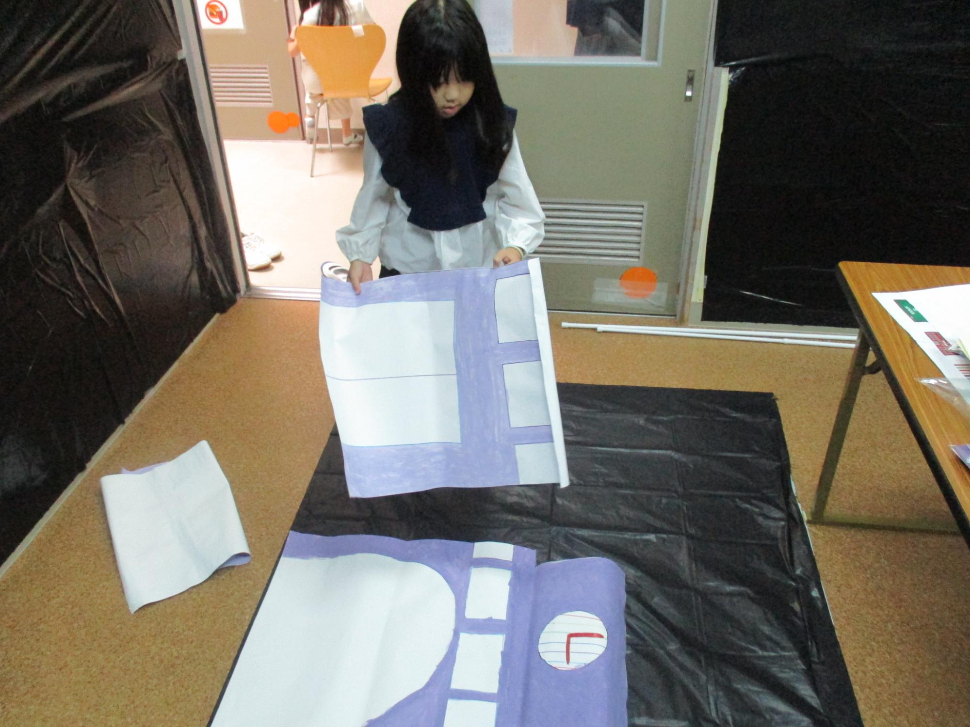 学校を貼り合わせている写真