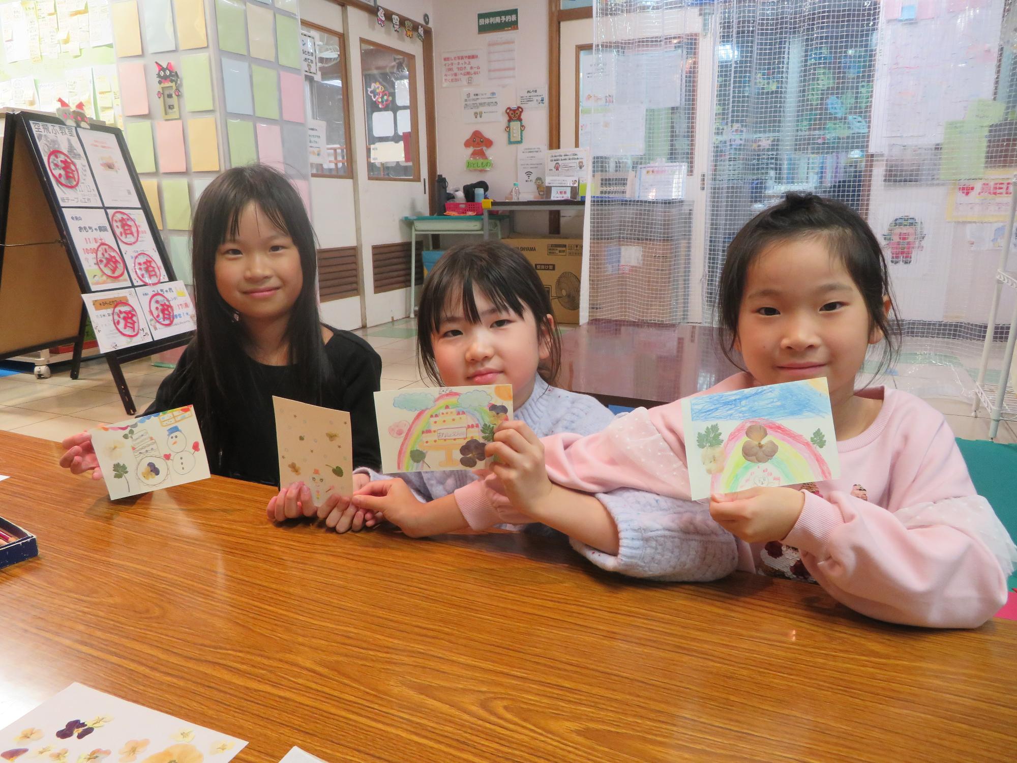 完成作品とこどもの写真