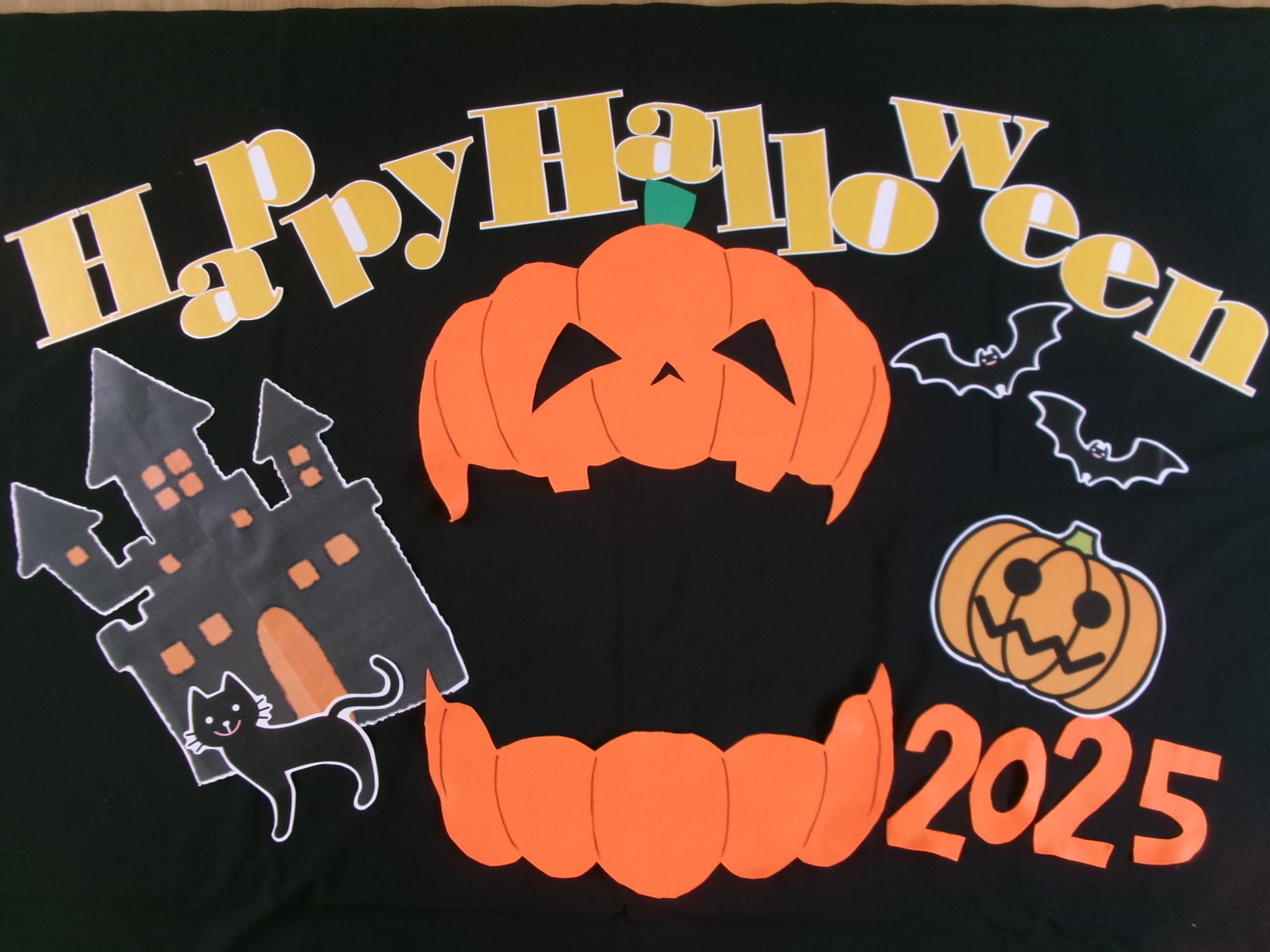 かぼちゃや黒猫などハロウィンにちなんだ背景の写真